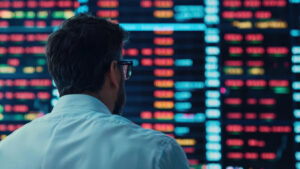 An energy procurement specialist monitors index pricing.