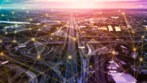 A cityscape overlaid by an energy grid to depict the rise of smart energy procurement strategies for commercial and industrial businesses.