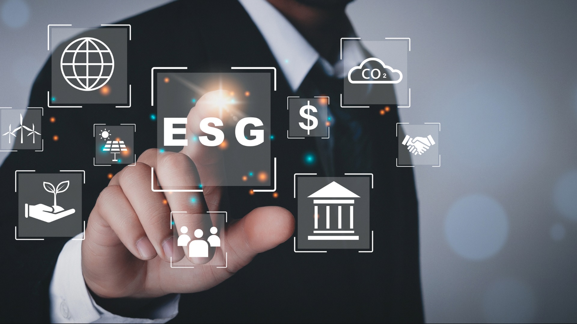 A man in a business suit touches symbols representing energy risk management's 5 levers.