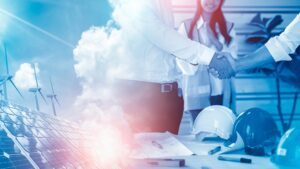Two energy procurement specialists shake hands, with renewable energy procurement options like wind and solar power appearing in the background.
