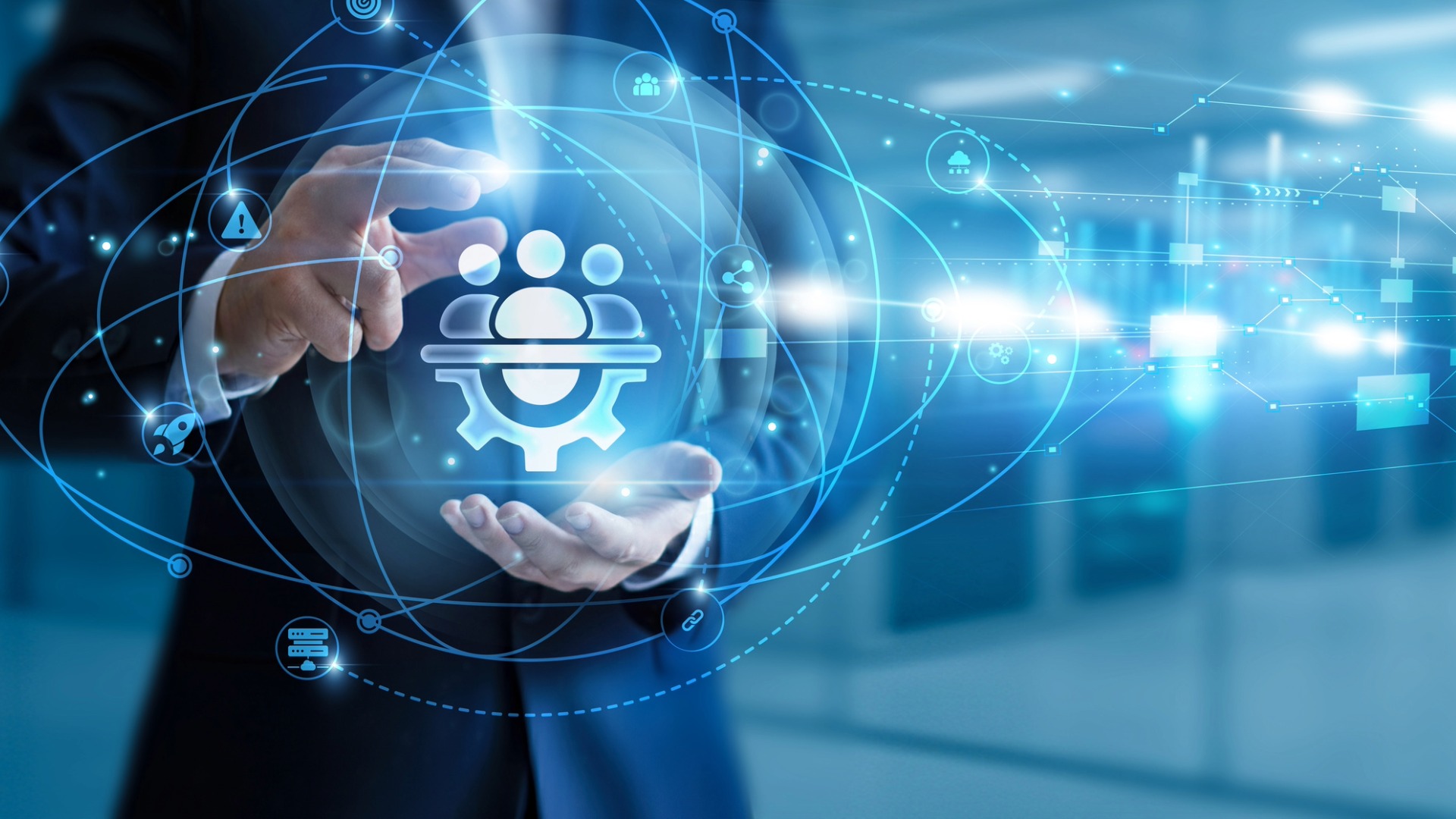 A man in a business suit holds a ball representing a ROI with energy demand management.