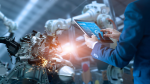 An energy procurement specialist measures peak load management data for a manufacturer.